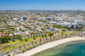 A panoramic view of Geelong, highlighting the city’s residential areas and coastline, reflecting Buxton’s report on rising housing market confidence and infrastructure growth.