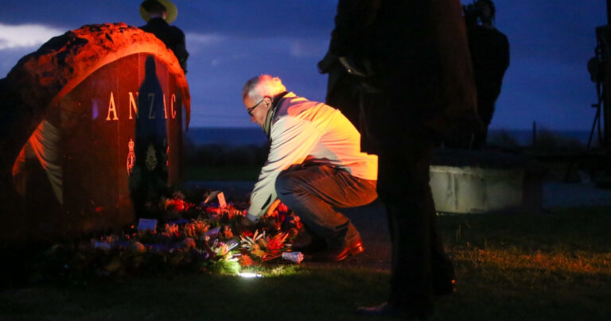 A wreath is placed at sunrise at Point Danger in Torquay, commemorating Anzac Day. Photo: PETER MARSHALL