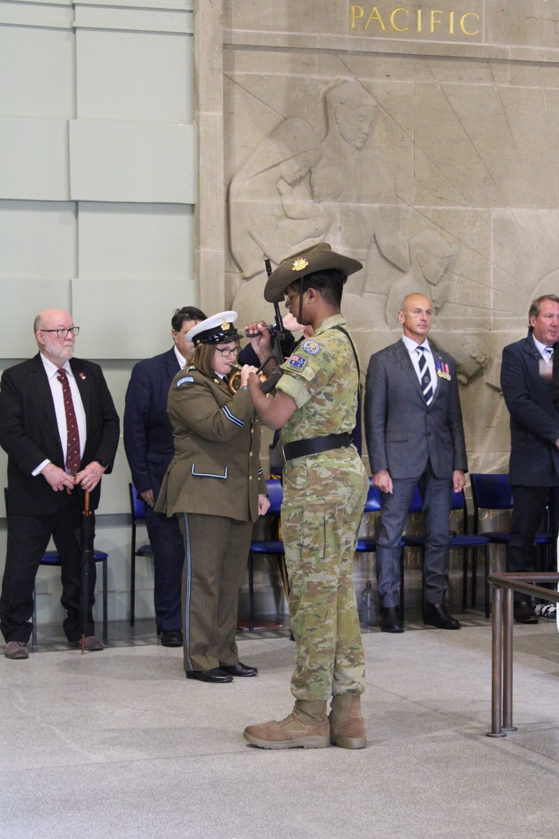 Bugler Christine Bowden played the Last Post and Rouse.