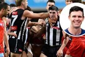Brayden Maynard charges into the half-time melee as Ben Long looks on during Gold Coast’s clash with Collingwood at People First Stadium. Picture: AAP/Dave Hunt
