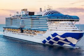 Luxury Viking cruise ship at sea during sunset, celebrating 50 years of ocean voyages