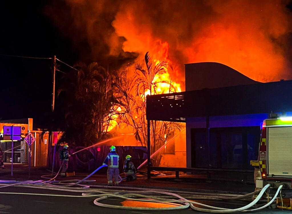 Firefighters battle a major blaze that destroyed a heritage listed cottage in Byron Bay’s town centre. Photo: Fire and Rescue NSW