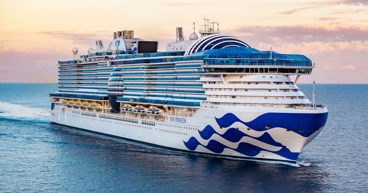Luxury Viking cruise ship at sea during sunset, celebrating 50 years of ocean voyages