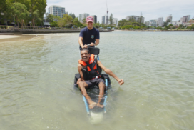 The beach wheelchair is light and easy to manoeuvre, making it simple to have fun in or out of the water. Photo: SUPPLIED