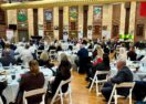 school leaders gather