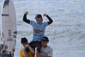 Lachlan Arghyros surfing