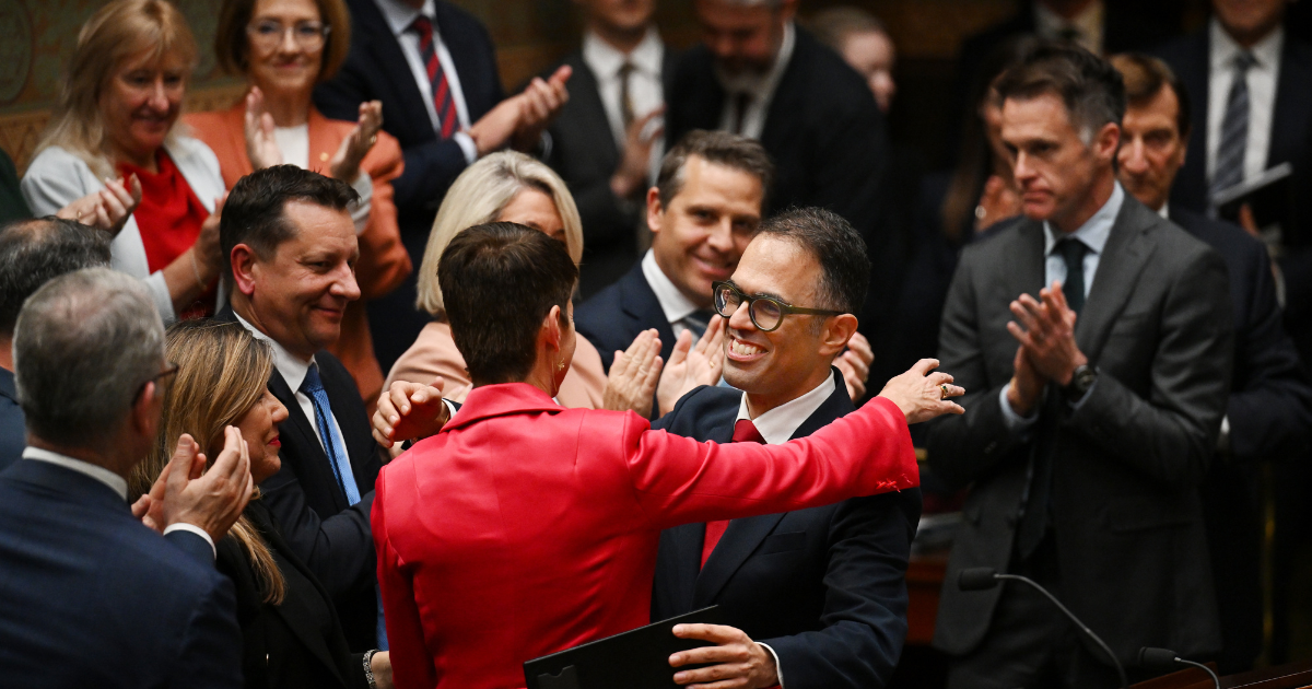 NSW Treasurer Daniel Mookhey hugs families and communities minister Kate Washington after delivering the 2025/26 state budget at Parliament House, Sydney, Tuesday, June 24. Photo: AAP