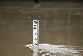 A flood marker is seen as Parramatta ferry wharf and river walk are flooded, at Parramatta, Sydney, Thursday, August 21, 2025. Photo: AAP