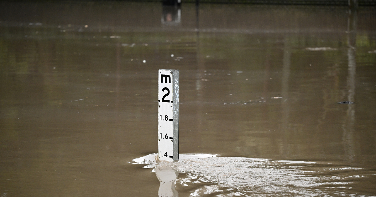 A flood marker is seen as Parramatta ferry wharf and river walk are flooded, at Parramatta, Sydney, Thursday, August 21, 2025. Photo: AAP