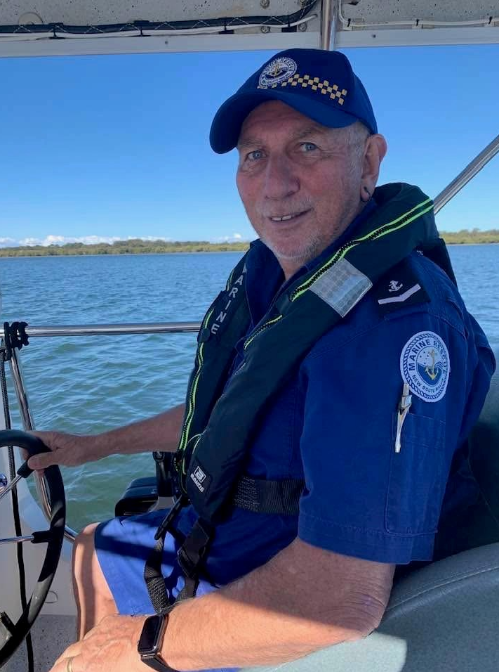 Marine Rescue Ballina volunteers honoured Bill Ewen during a flower floating ceremony at South Ballina Beach. Photo: Marine Rescue NSW.