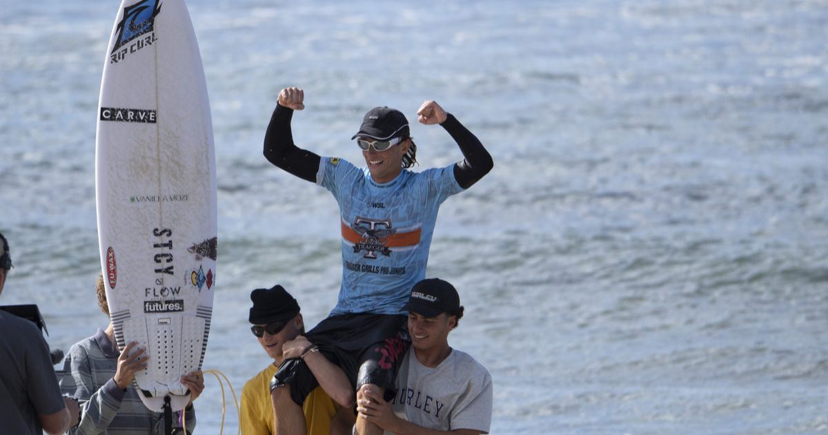 Lachlan Arghyros surfing