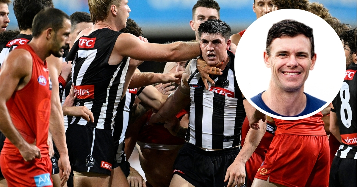 Brayden Maynard charges into the half-time melee as Ben Long looks on during Gold Coast’s clash with Collingwood at People First Stadium. Picture: AAP/Dave Hunt
